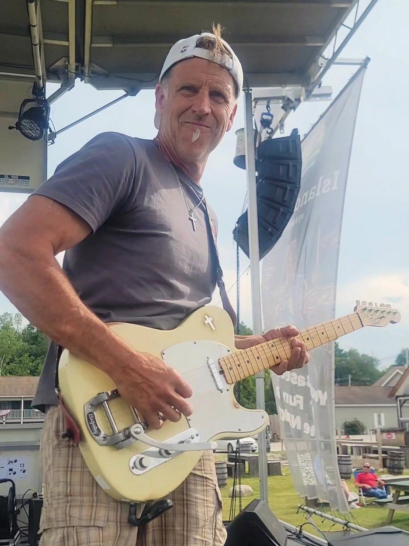 Jules Rancourt performing on guitar