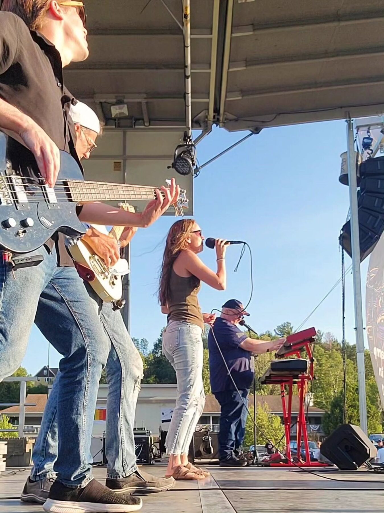 Rock On performing on an outdoor stage