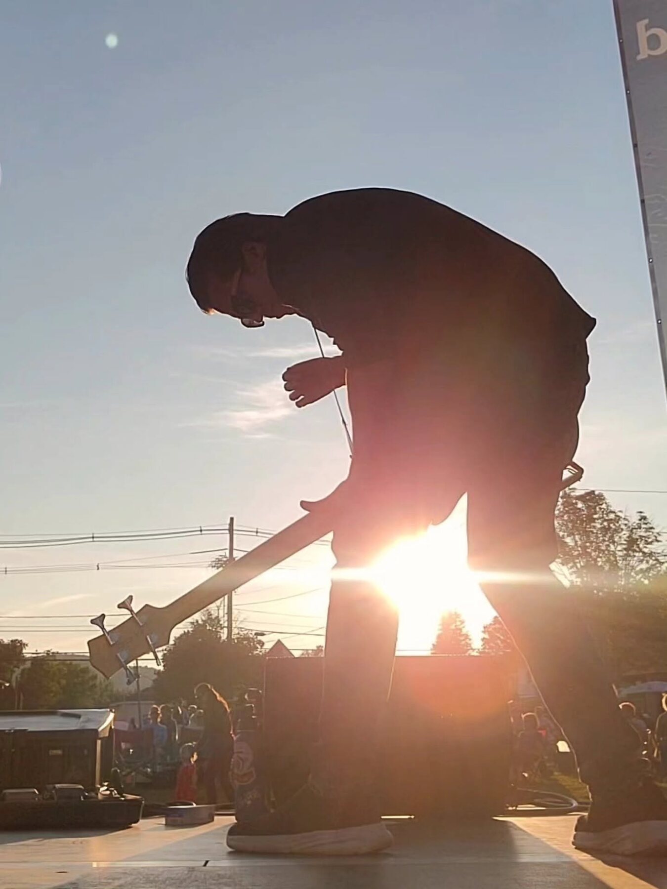 Tom Jordan silhouetted against the setting sun